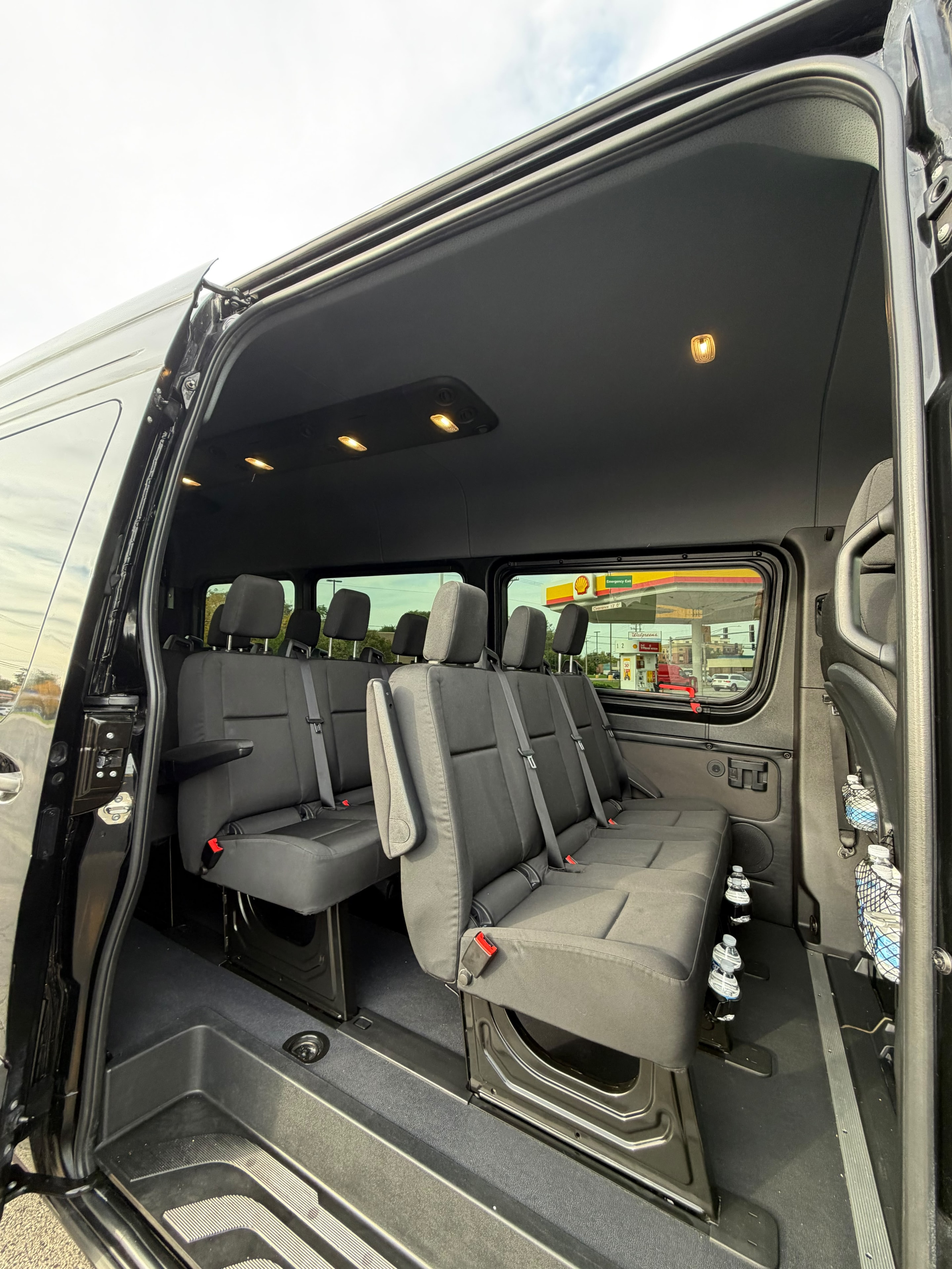Sprinter van interior seating with open side door